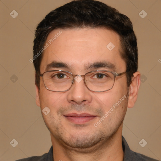 Joyful white adult male with short  brown hair and brown eyes