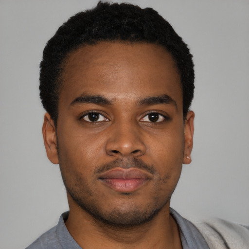 Neutral latino young-adult male with short  brown hair and brown eyes