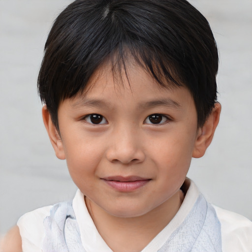 Joyful white child female with short  brown hair and brown eyes
