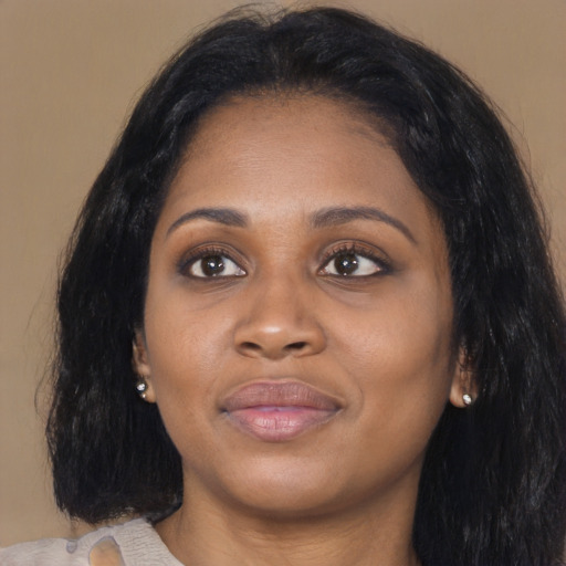 Joyful asian young-adult female with medium  black hair and brown eyes