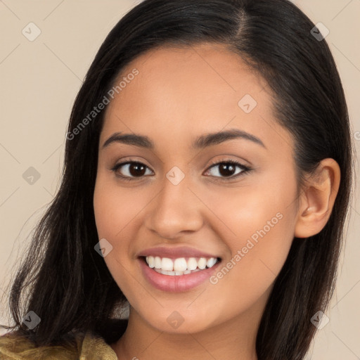 Joyful latino young-adult female with long  brown hair and brown eyes