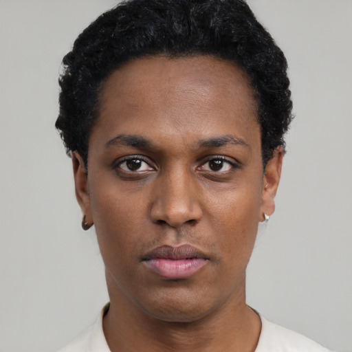 Neutral black young-adult female with short  black hair and brown eyes