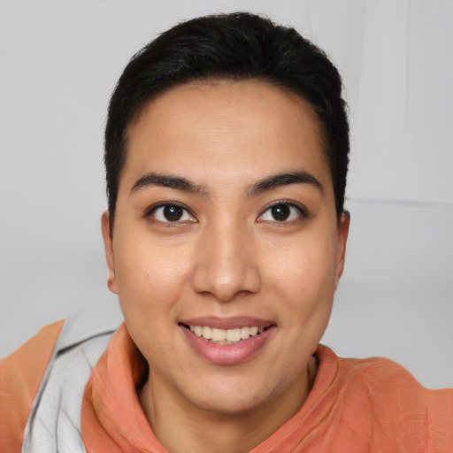 Joyful asian young-adult female with short  black hair and brown eyes