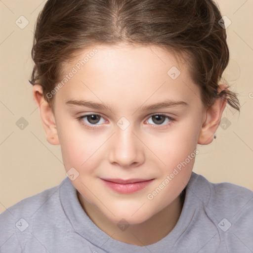 Joyful white child female with short  brown hair and brown eyes