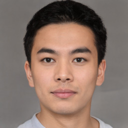 Neutral asian young-adult male with short  black hair and brown eyes