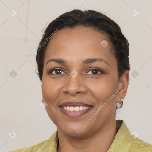 Joyful latino young-adult female with short  brown hair and brown eyes