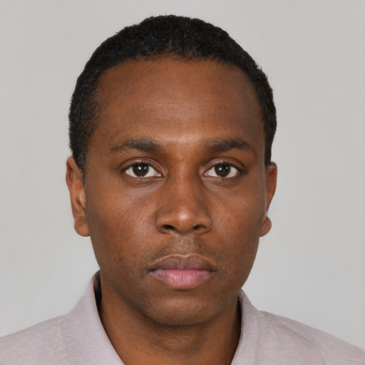 Neutral black young-adult male with short  black hair and brown eyes