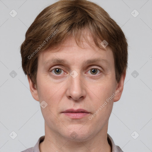 Joyful white adult male with short  brown hair and grey eyes