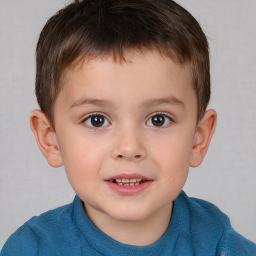 Joyful white child male with short  brown hair and brown eyes