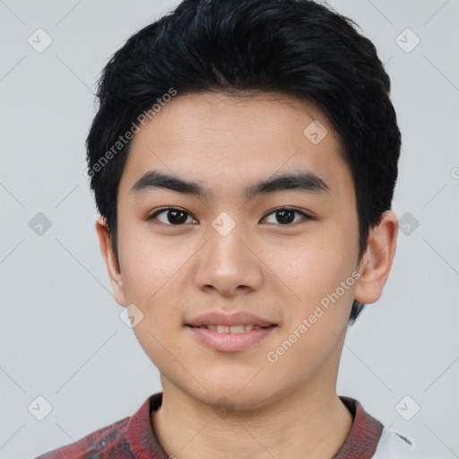 Joyful latino young-adult male with short  black hair and brown eyes