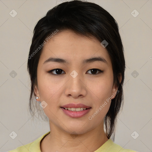 Joyful asian young-adult female with medium  brown hair and brown eyes