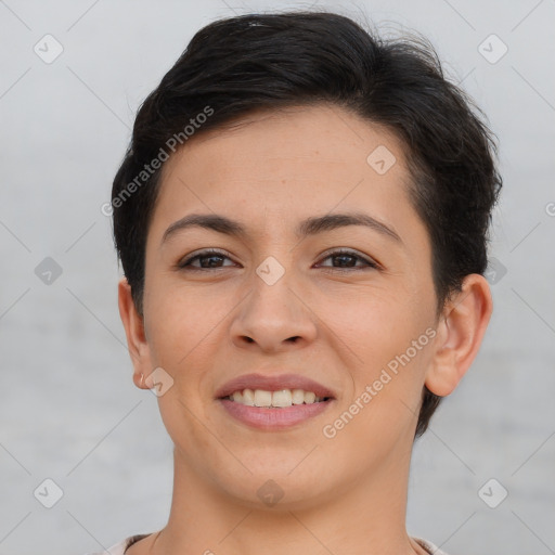 Joyful asian young-adult female with short  brown hair and brown eyes