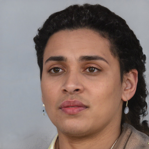 Neutral latino young-adult female with short  black hair and brown eyes