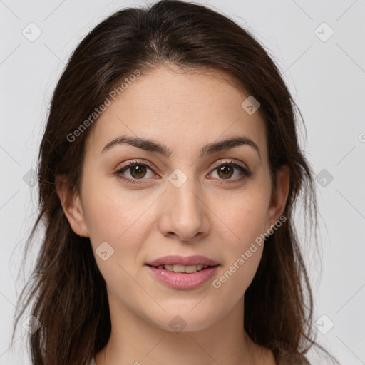 Joyful white young-adult female with long  brown hair and brown eyes