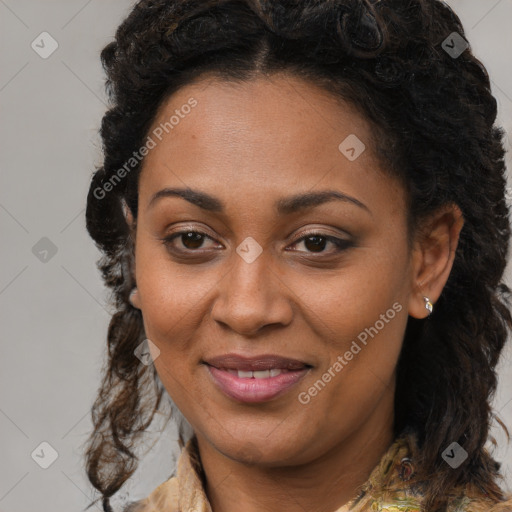 Joyful black young-adult female with long  brown hair and brown eyes