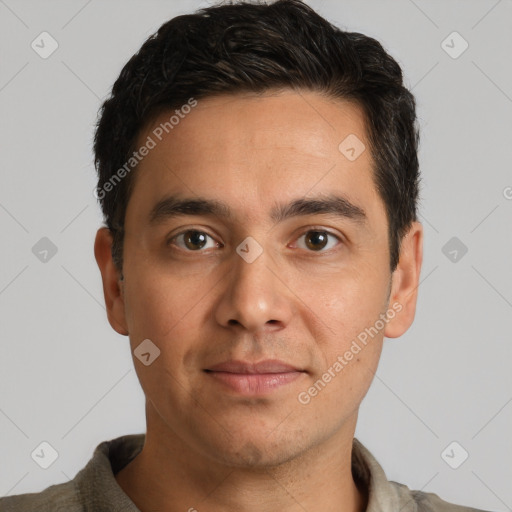 Joyful white adult male with short  brown hair and brown eyes