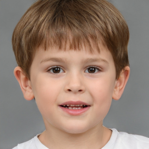 Joyful white child male with short  brown hair and brown eyes