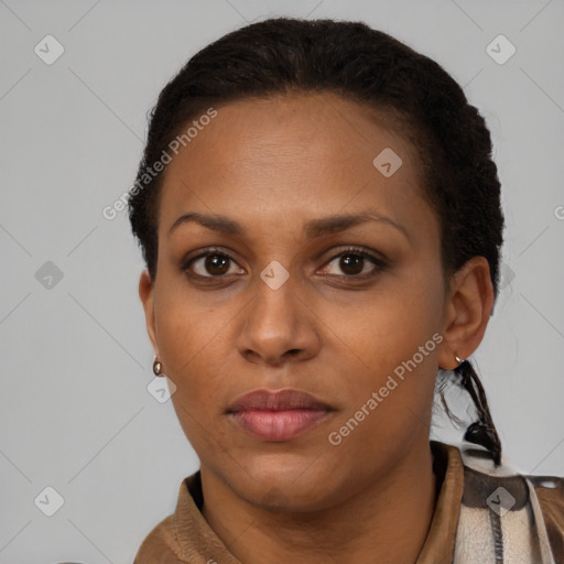 Neutral black young-adult female with short  brown hair and brown eyes