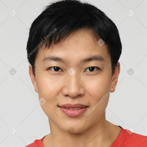 Joyful asian young-adult male with short  brown hair and brown eyes