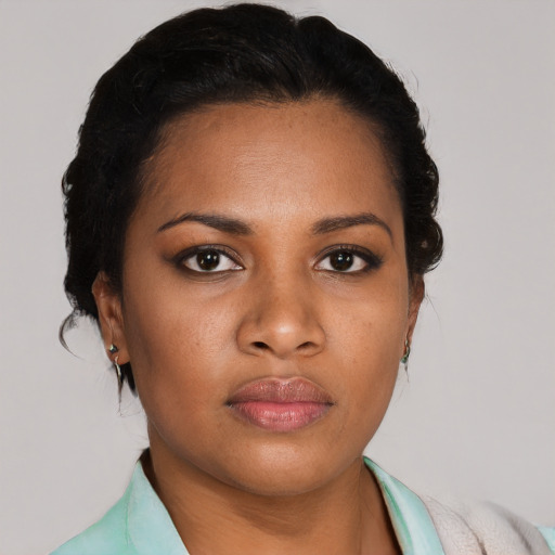 Neutral black young-adult female with short  brown hair and brown eyes