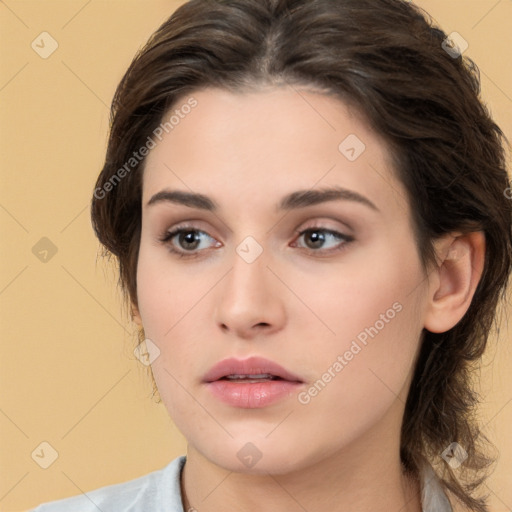 Neutral white young-adult female with medium  brown hair and brown eyes