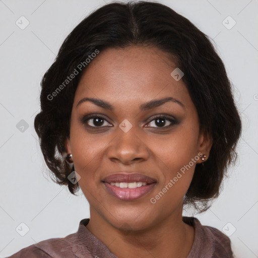 Joyful black young-adult female with medium  brown hair and brown eyes