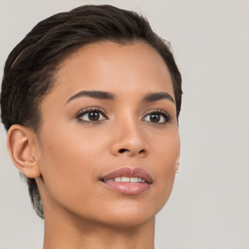 Joyful white young-adult female with short  brown hair and brown eyes