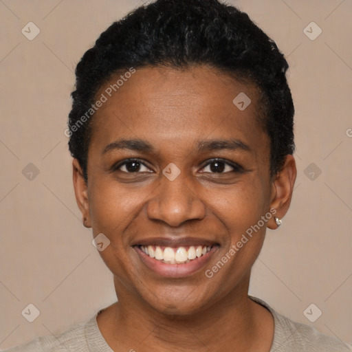 Joyful black young-adult female with short  black hair and brown eyes