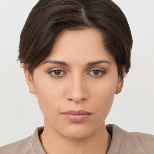 Neutral white young-adult female with short  brown hair and brown eyes