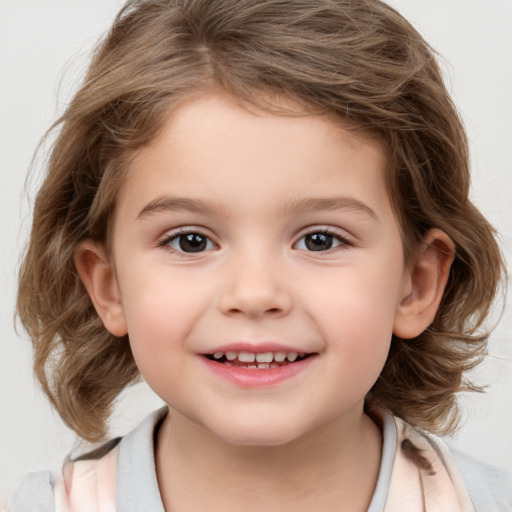 Joyful white child female with medium  brown hair and brown eyes