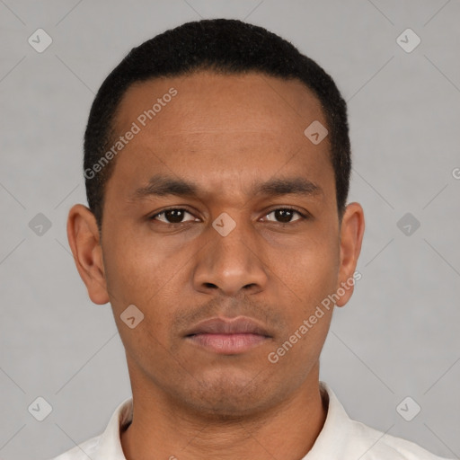 Neutral latino young-adult male with short  black hair and brown eyes