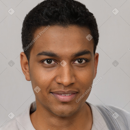 Joyful black young-adult male with short  black hair and brown eyes