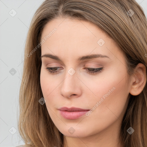 Neutral white young-adult female with long  brown hair and brown eyes