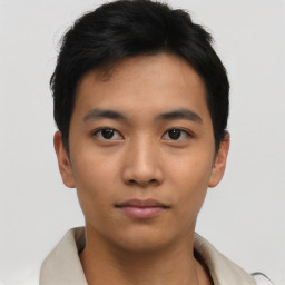 Neutral asian young-adult male with short  brown hair and brown eyes