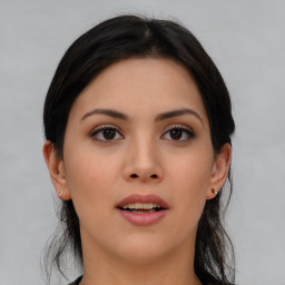 Joyful asian young-adult female with medium  black hair and brown eyes