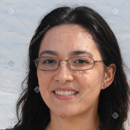 Joyful white adult female with long  brown hair and brown eyes