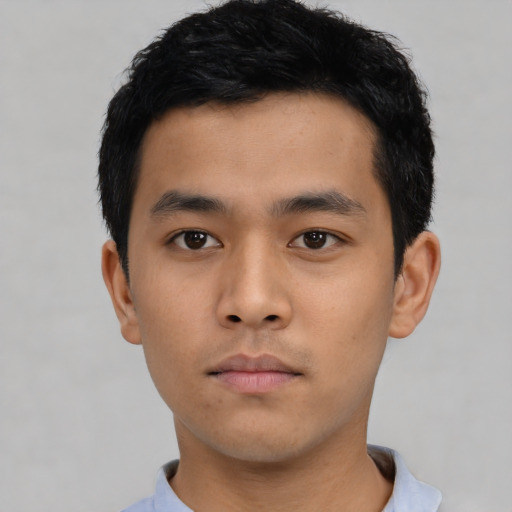 Neutral asian child male with short  black hair and brown eyes