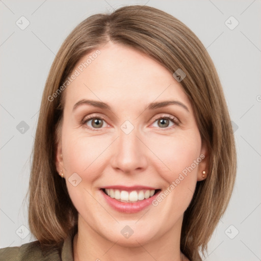 Joyful white young-adult female with medium  brown hair and green eyes