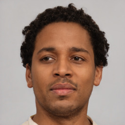 Neutral black young-adult male with short  brown hair and brown eyes