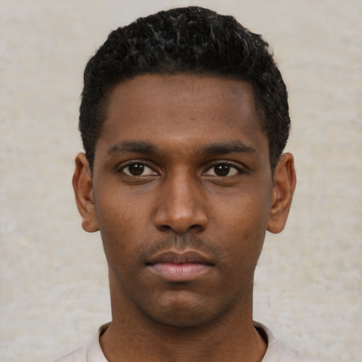 Neutral black young-adult male with short  black hair and brown eyes
