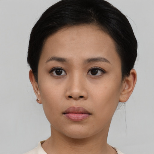 Neutral asian young-adult female with short  black hair and brown eyes