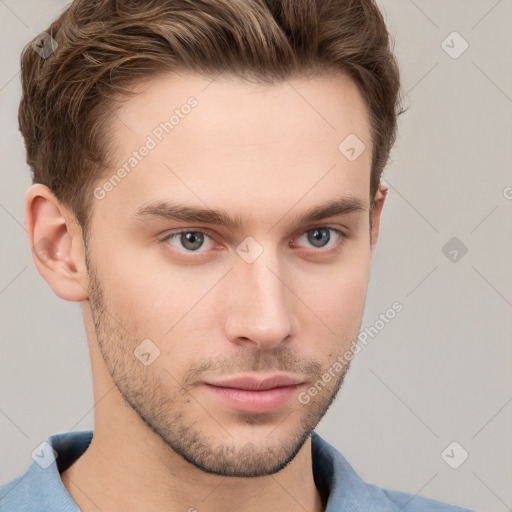 Neutral white young-adult male with short  brown hair and grey eyes