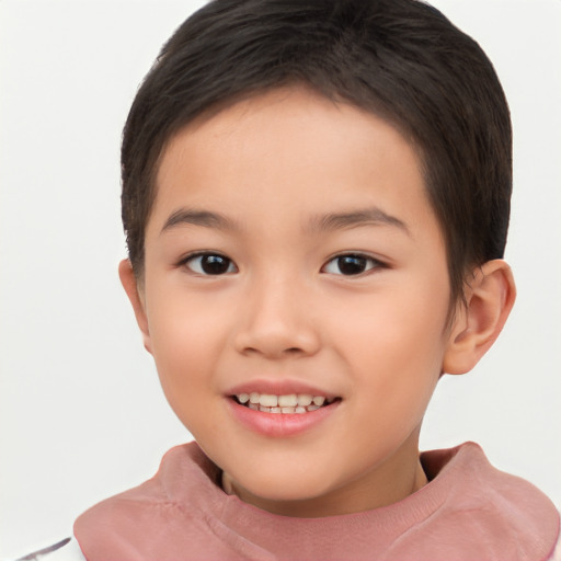 Joyful white child female with short  brown hair and brown eyes