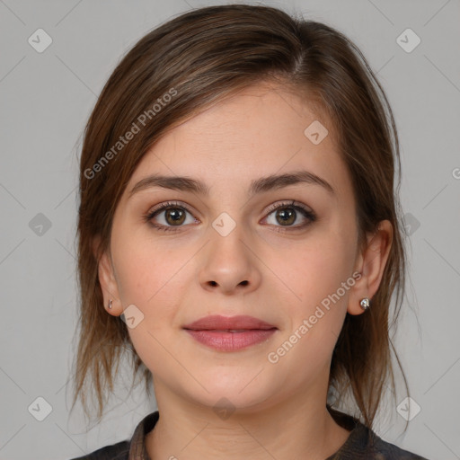 Neutral white young-adult female with medium  brown hair and brown eyes