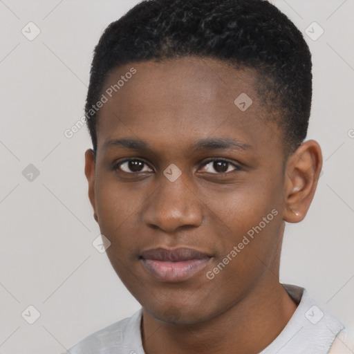 Joyful black young-adult male with short  brown hair and brown eyes