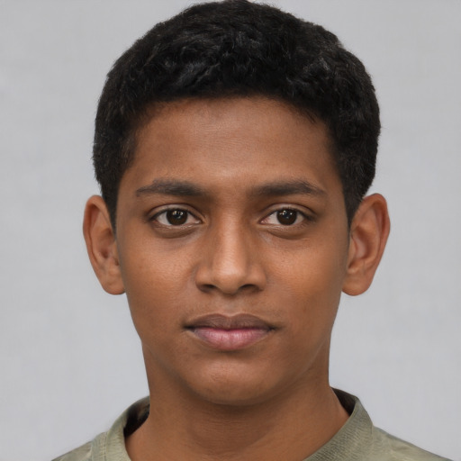 Neutral black young-adult male with short  black hair and brown eyes