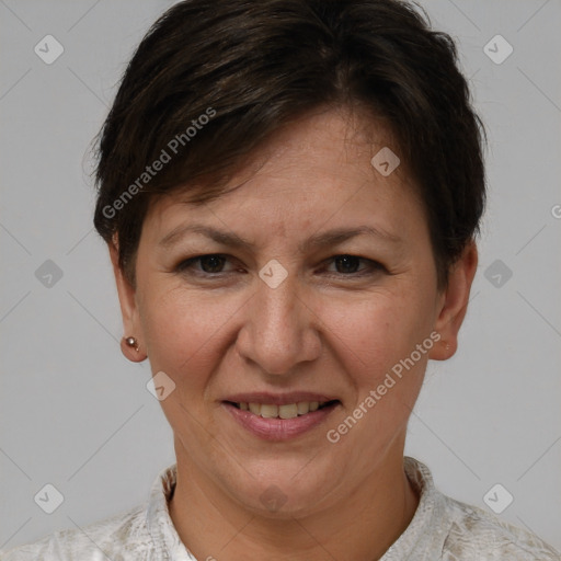 Joyful white adult female with short  brown hair and brown eyes