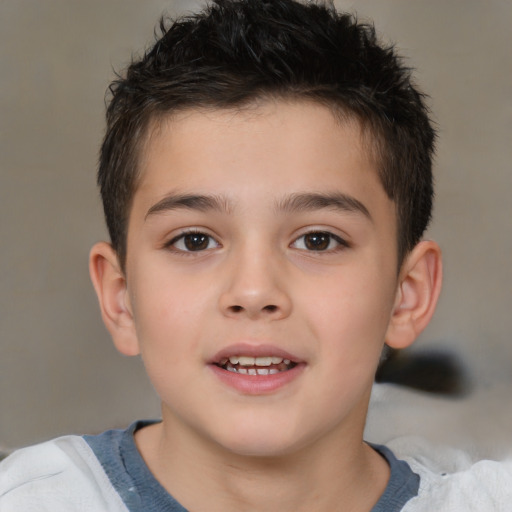 Joyful white child male with short  brown hair and brown eyes