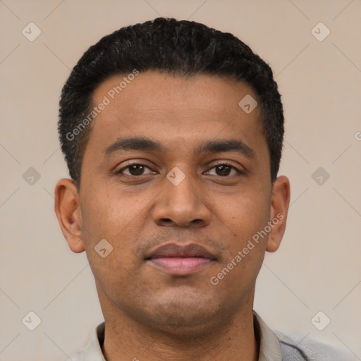Neutral latino young-adult male with short  black hair and brown eyes