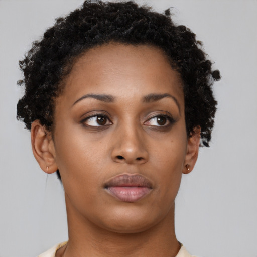Neutral black young-adult female with short  brown hair and brown eyes